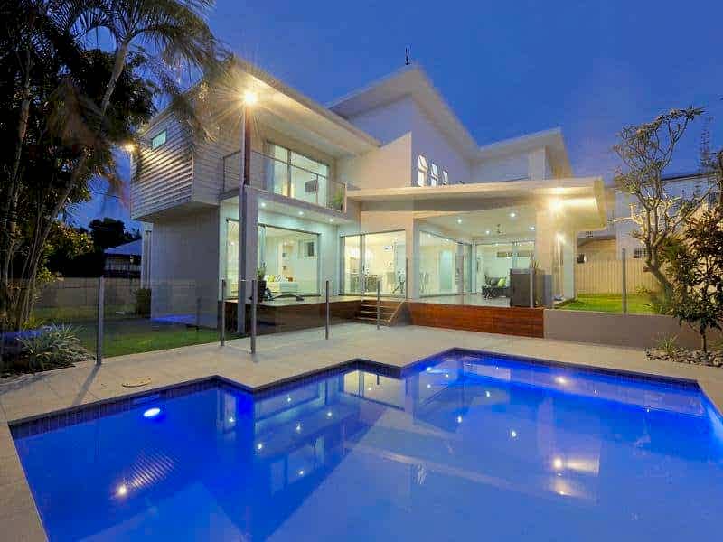 White Villa with spacious pool made by Wahoo Pool builders